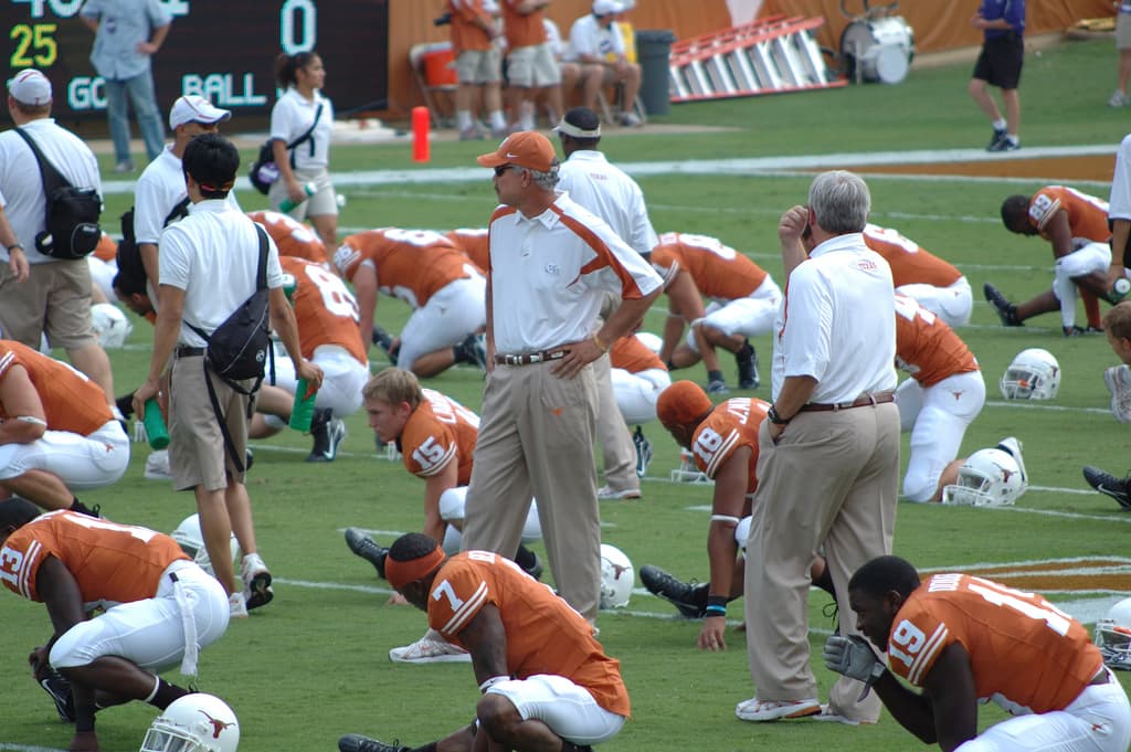Jugadores de Texas durante el calentamiento antes de un partido en 2007.